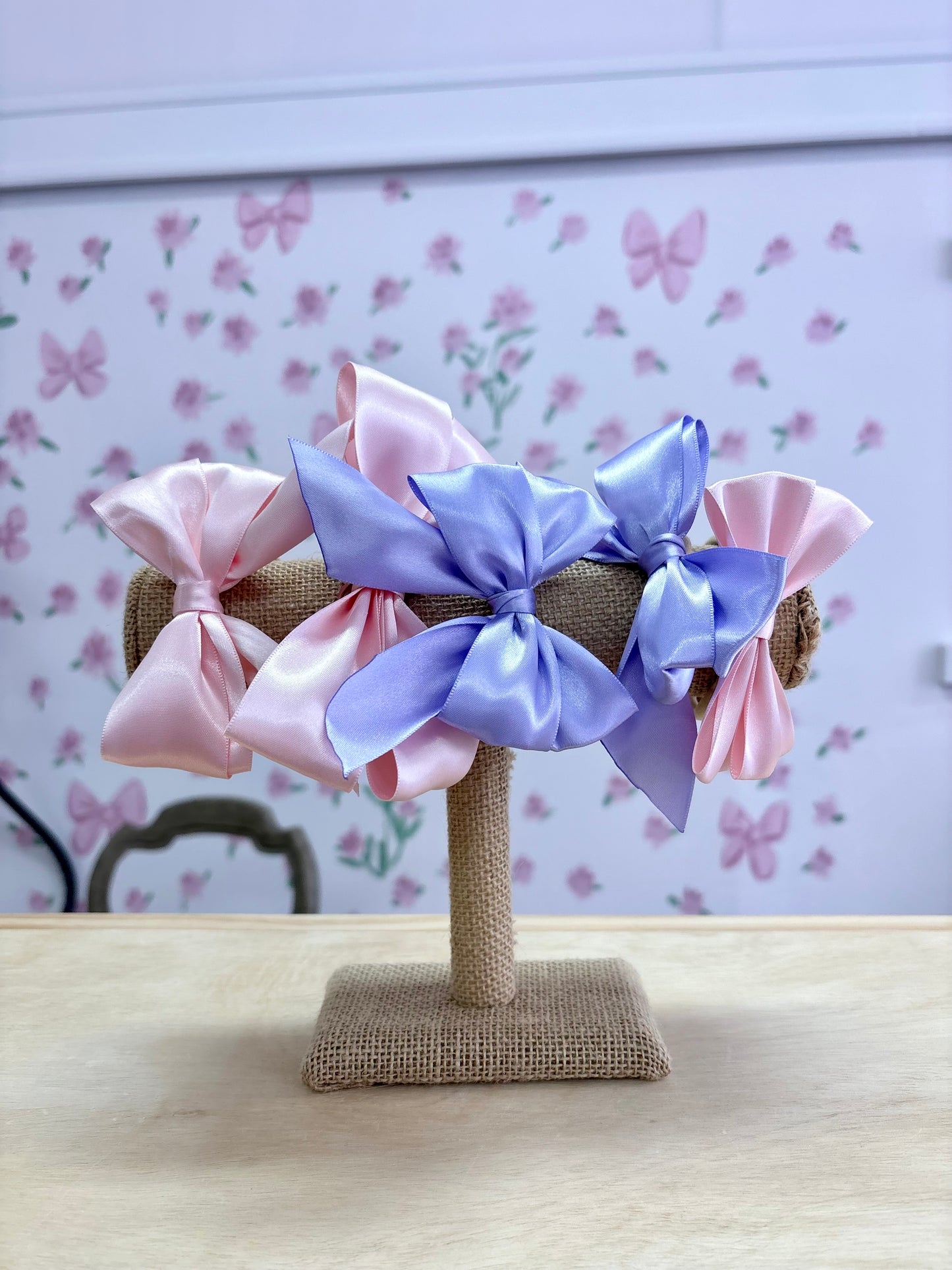 Light pink satin bow on nylon headband