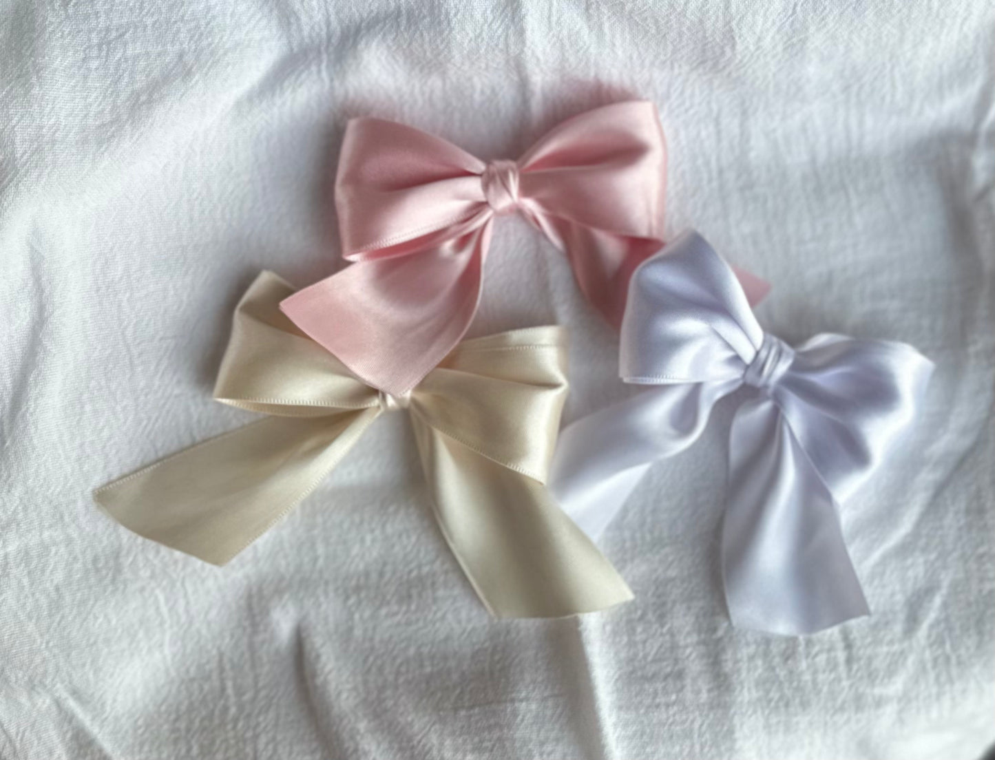 3 pack of satin bows on clear elastics