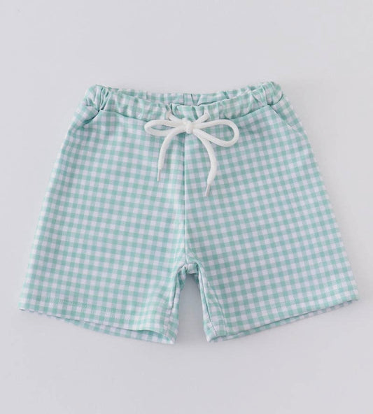 Green gingham swim trunks