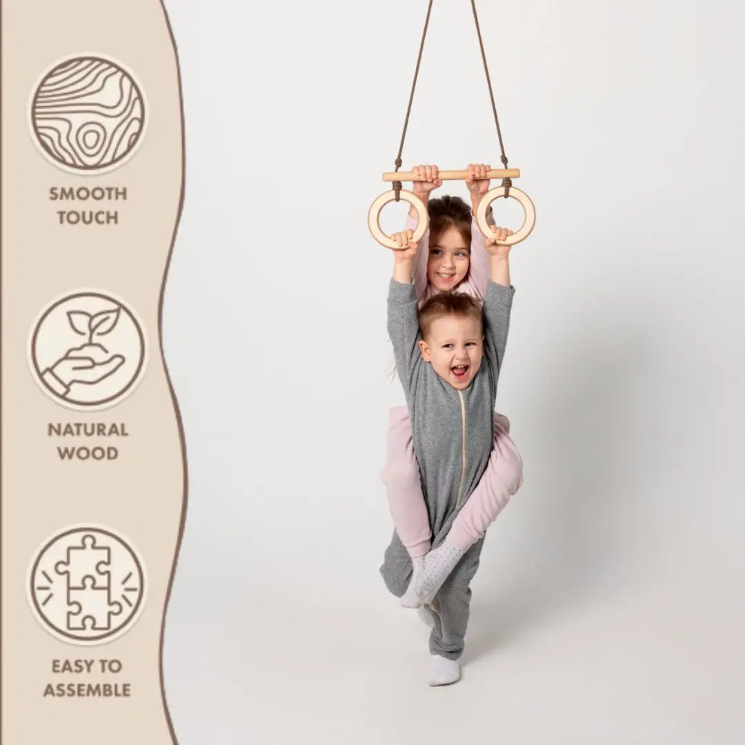 Trapeze swing bar with rings